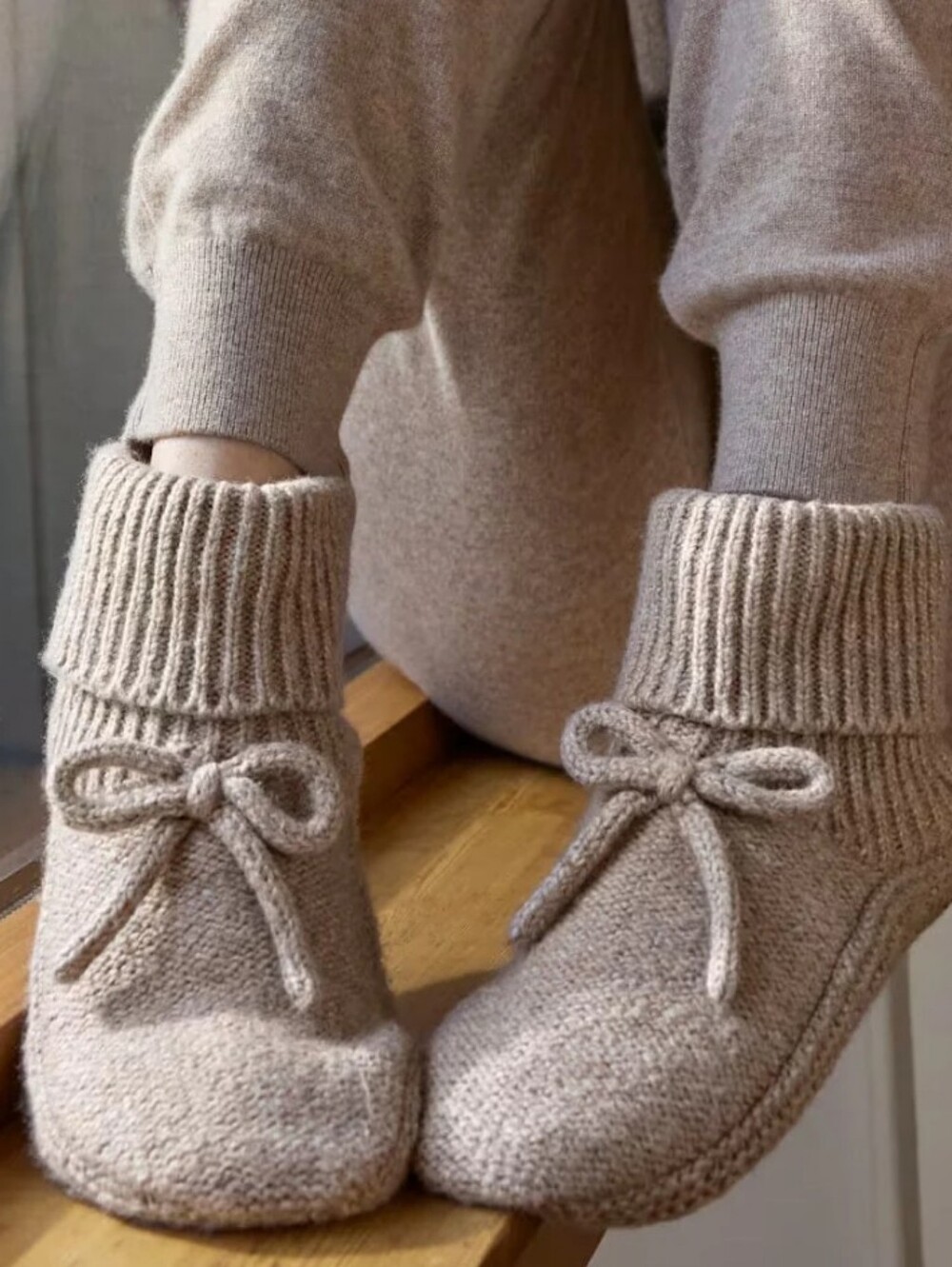 Bombas taupe sherpa lined knit gripper sock slippers with a bow